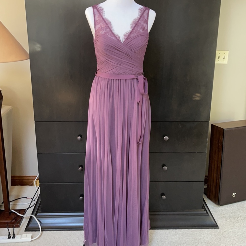 BHLDN Bridesmaid Nouvelle Fleur dress in purple.